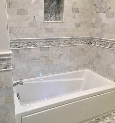 Light Gray Decorative Tile around Tub in Schaumburg